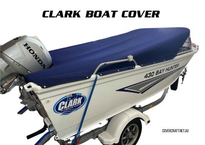 Navy blue boat cover on a Clark boat